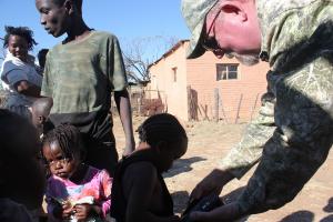 Handing out candy and crayons